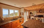 The kitchen windows make the most of large gorge views.